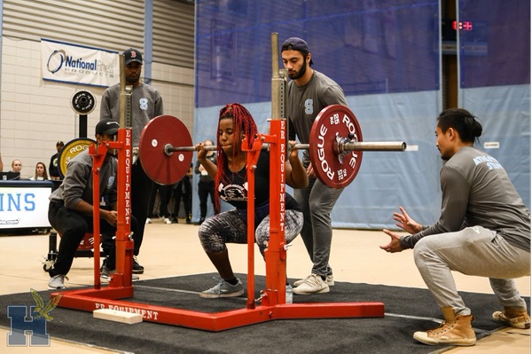 Nefertiti squatting in competition