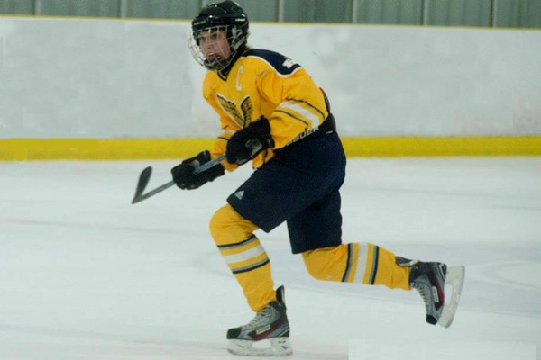 Michelle Noorenberghe skating in a hockey game