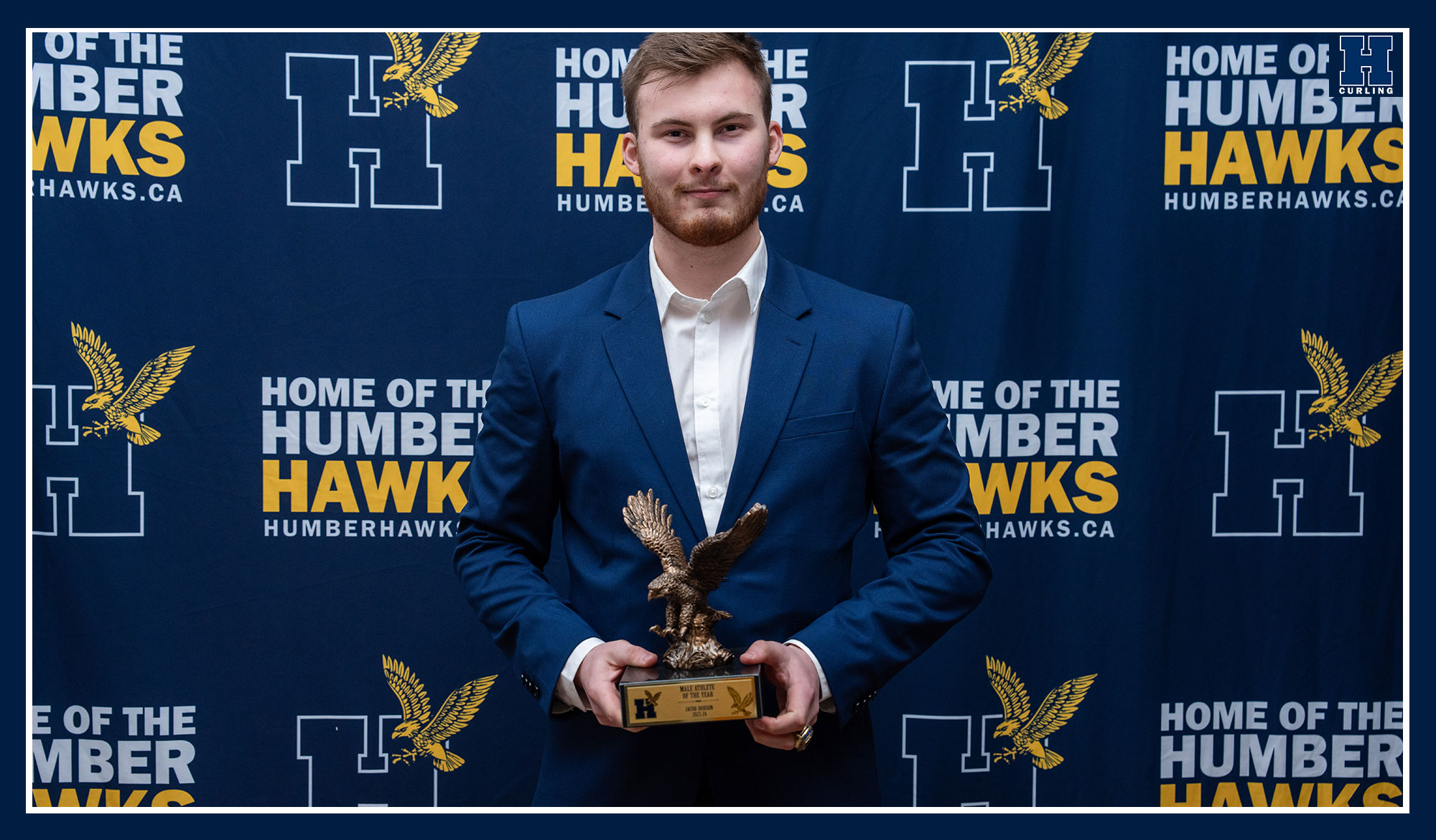 Dobson receiving his award