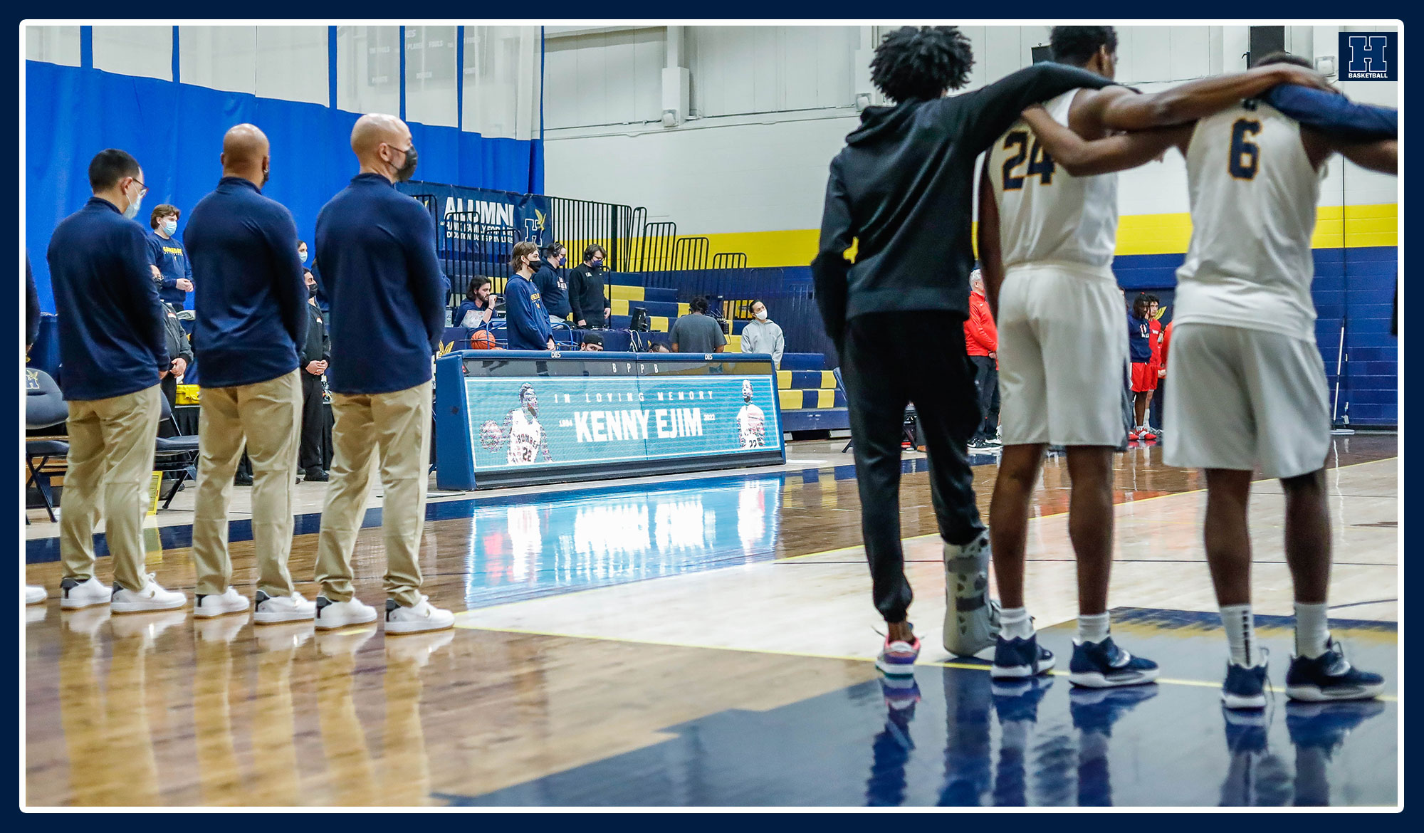 Men's team lined up during Kenny Ejim tribute