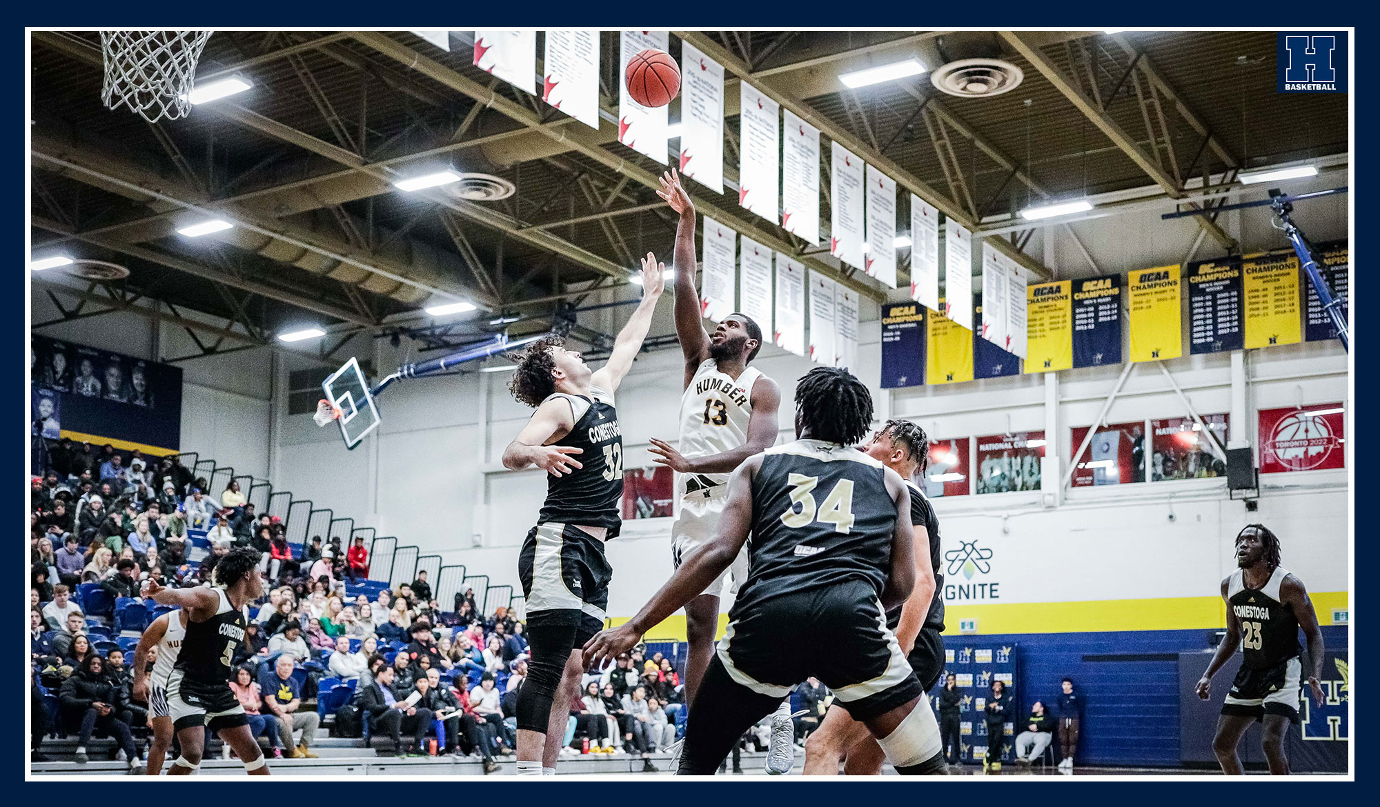 Jamani Barrett hitting a floater over a Conestoga defender