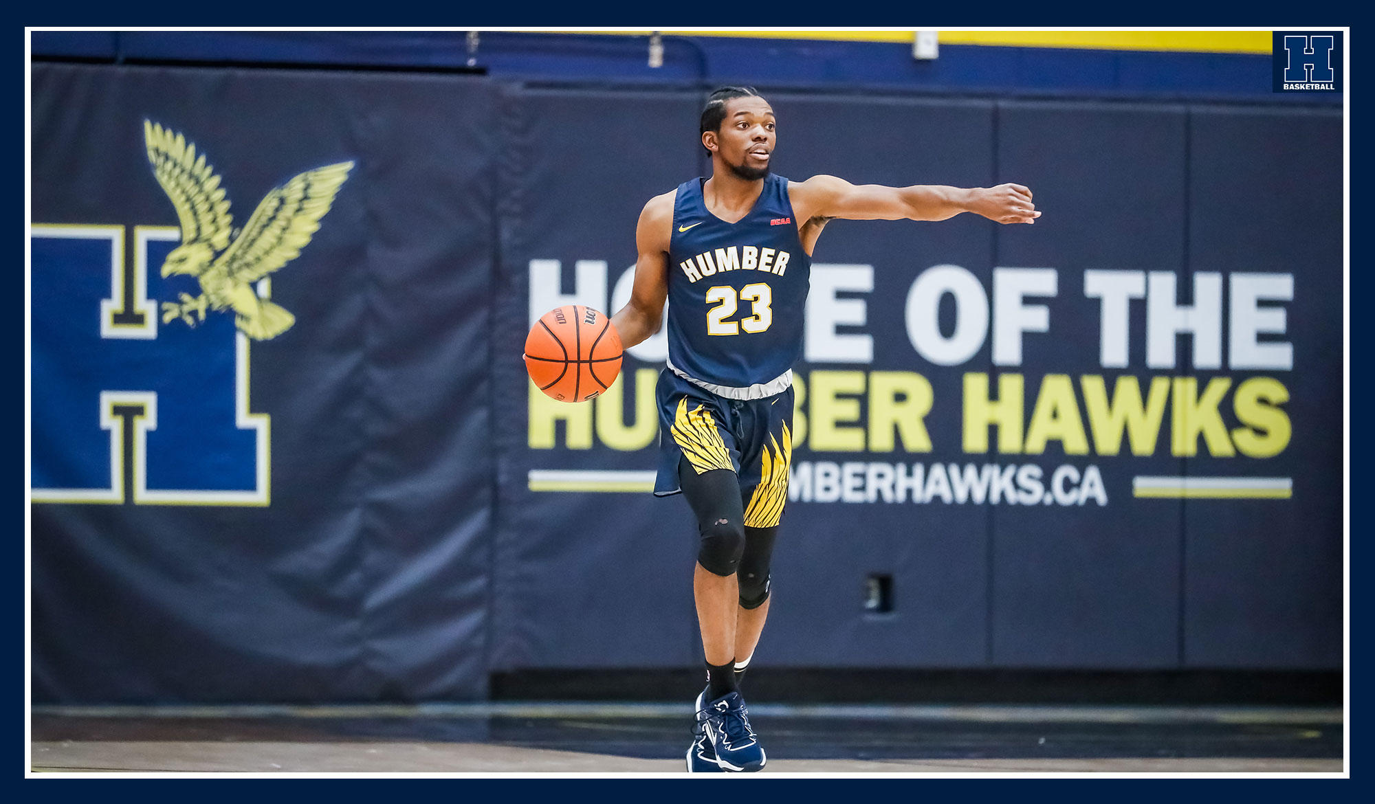Dwayne bringing the ball up the court for the Hawks