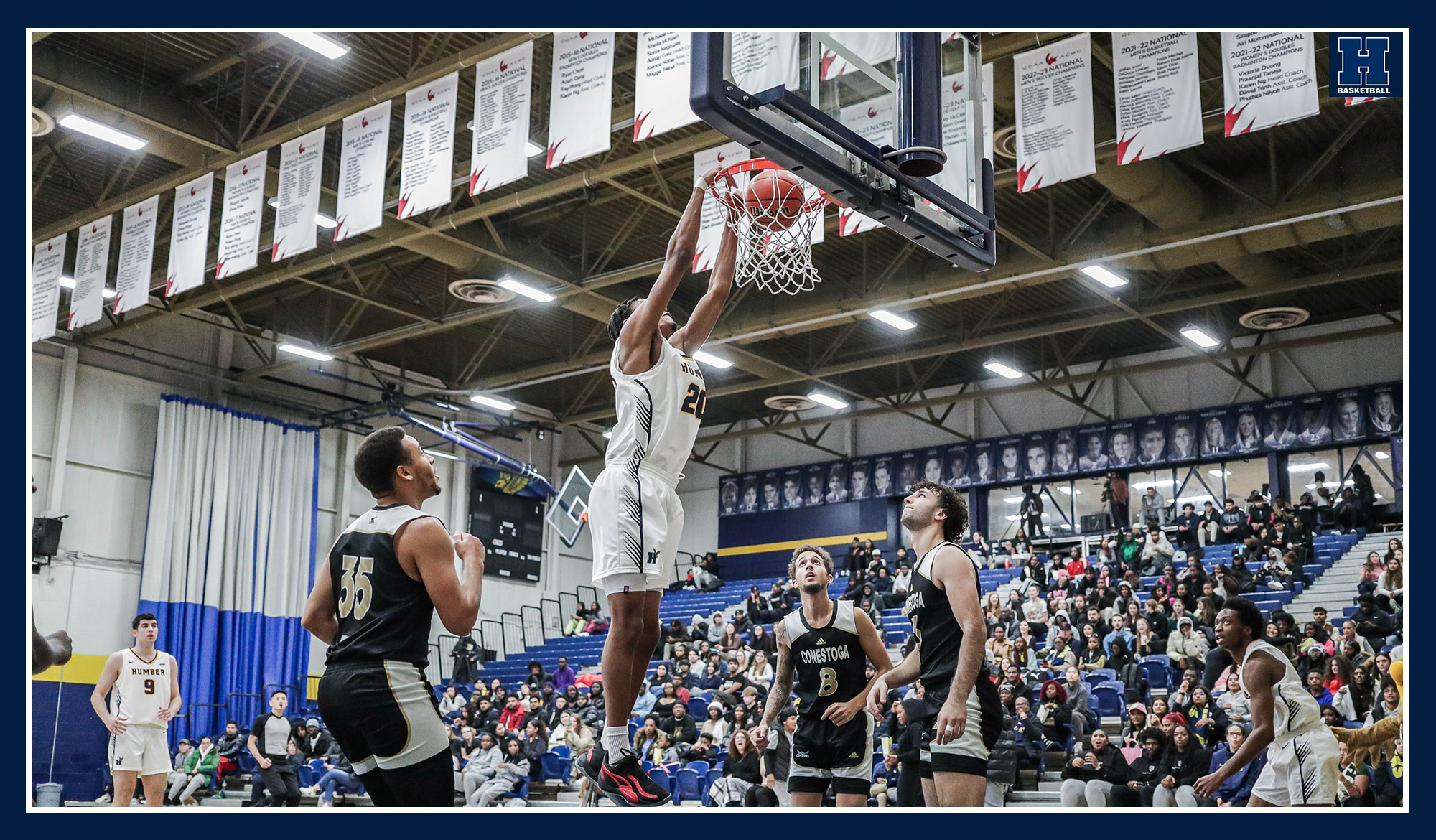 Taujh making a dunk during the game