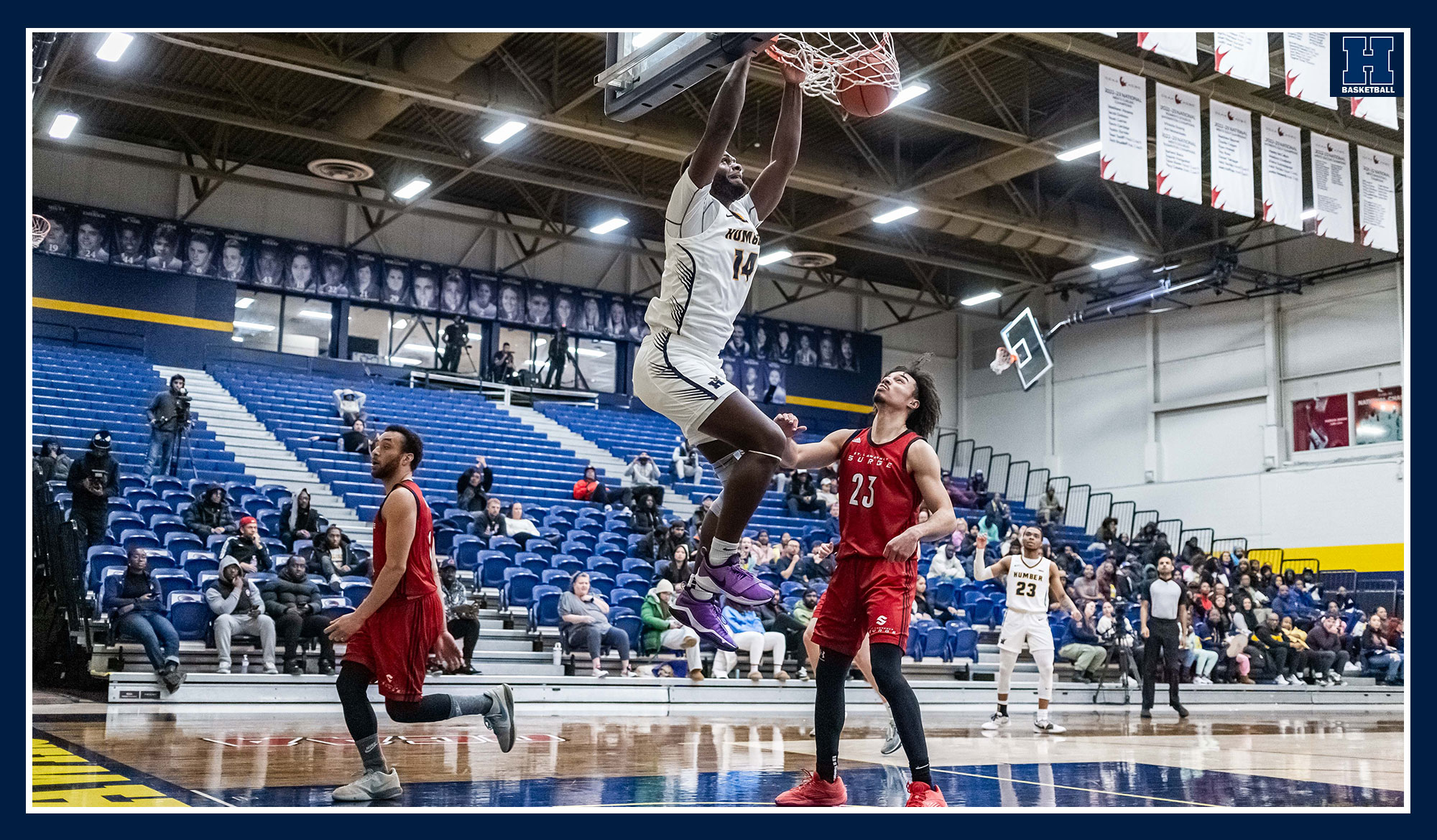 Jamani dunking against St. Lawrence