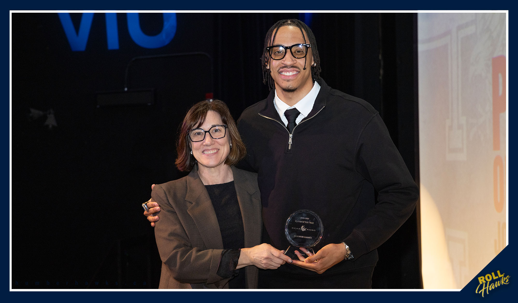 Malik Grant receiving his player of the year award