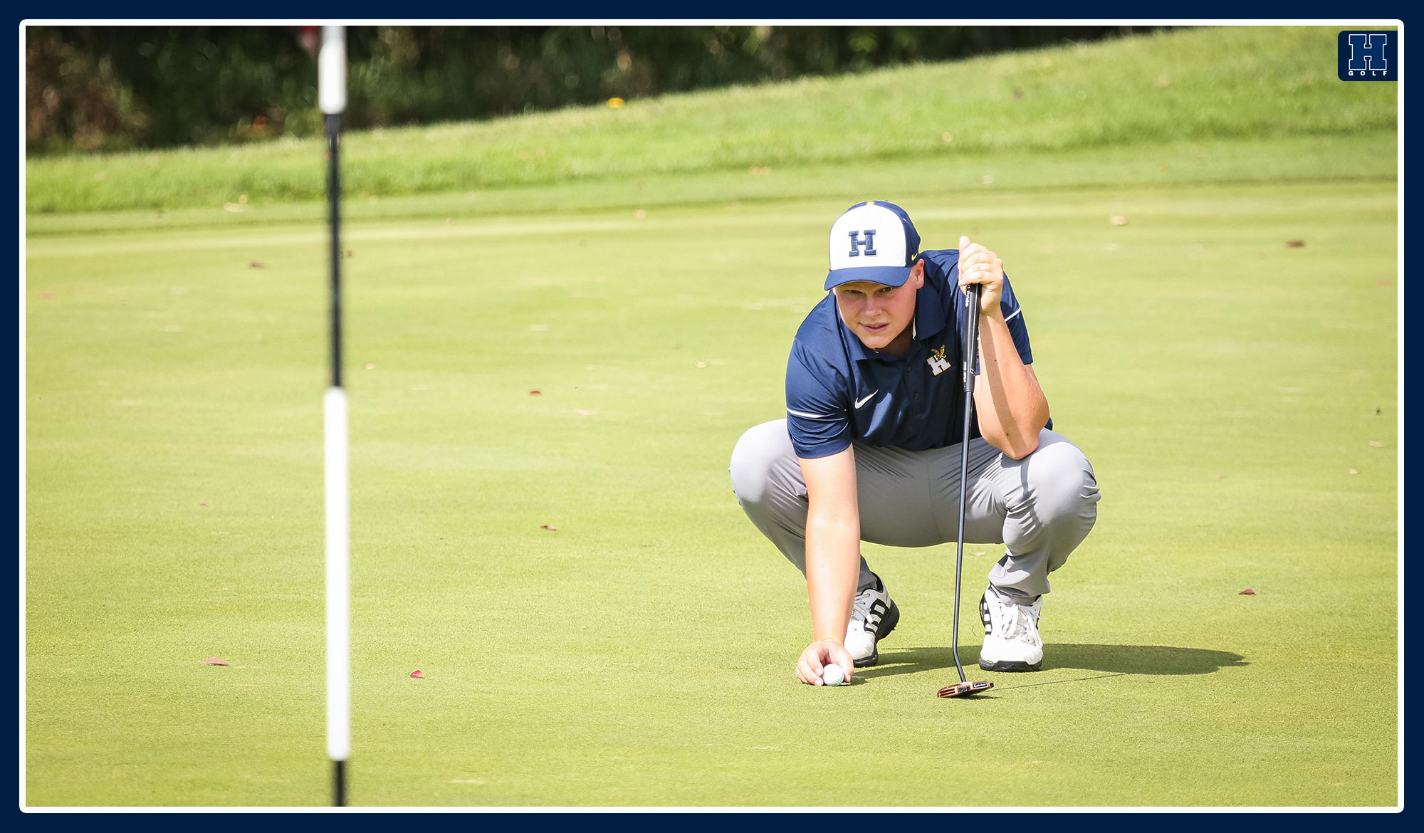 Matthew Bremer lining up his putt.