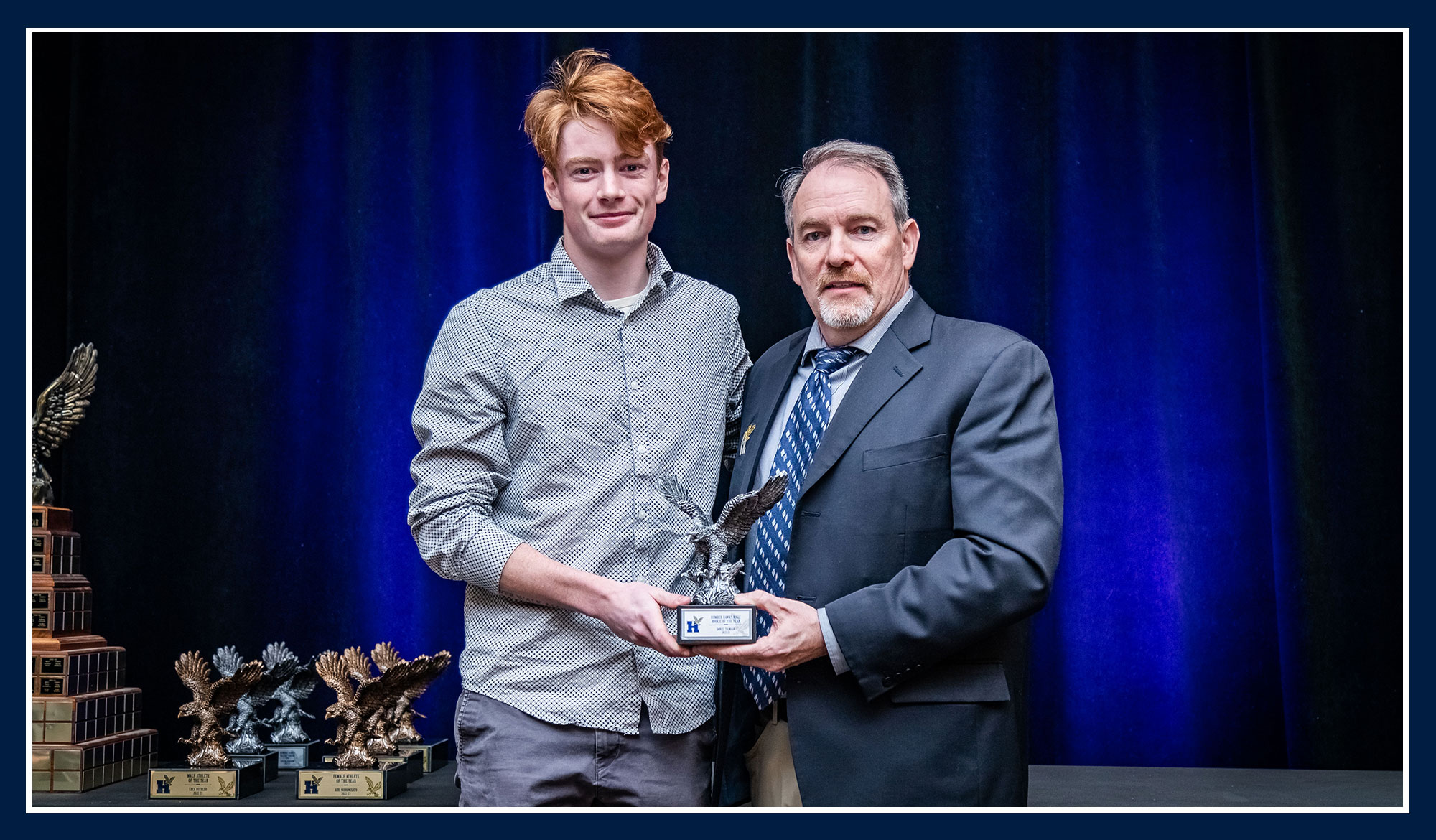 Daniel receiving his award from Ray Chateau