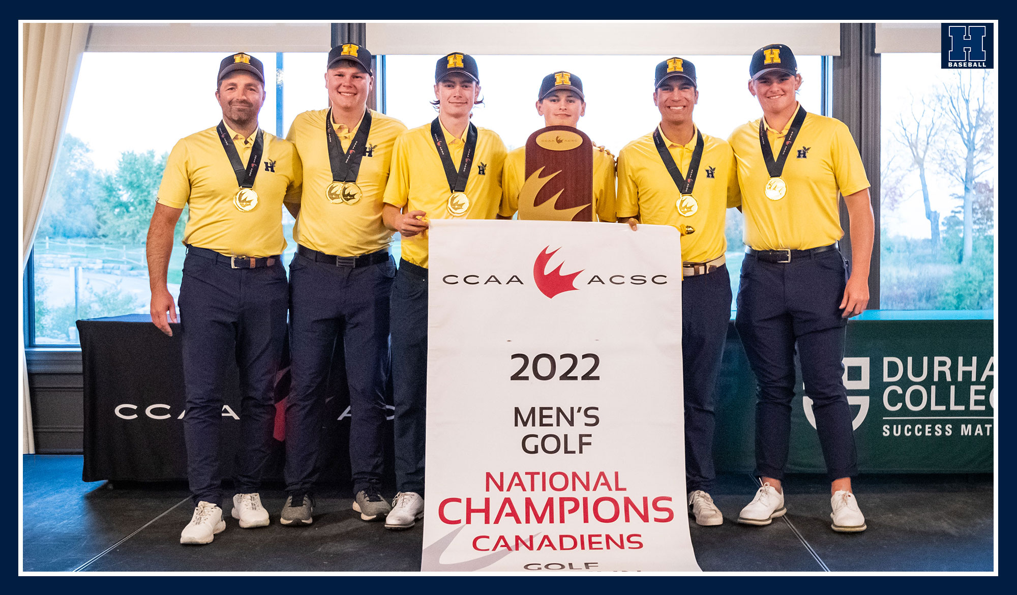 Men's golf posing with national banner