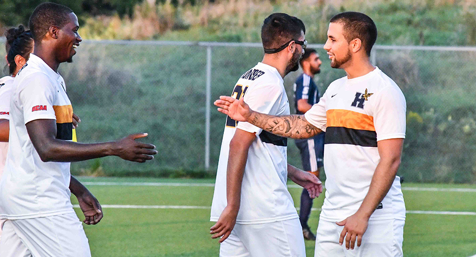 VOCI STYMIES BRUINS; HAWKS EXTEND STREAK TO 38