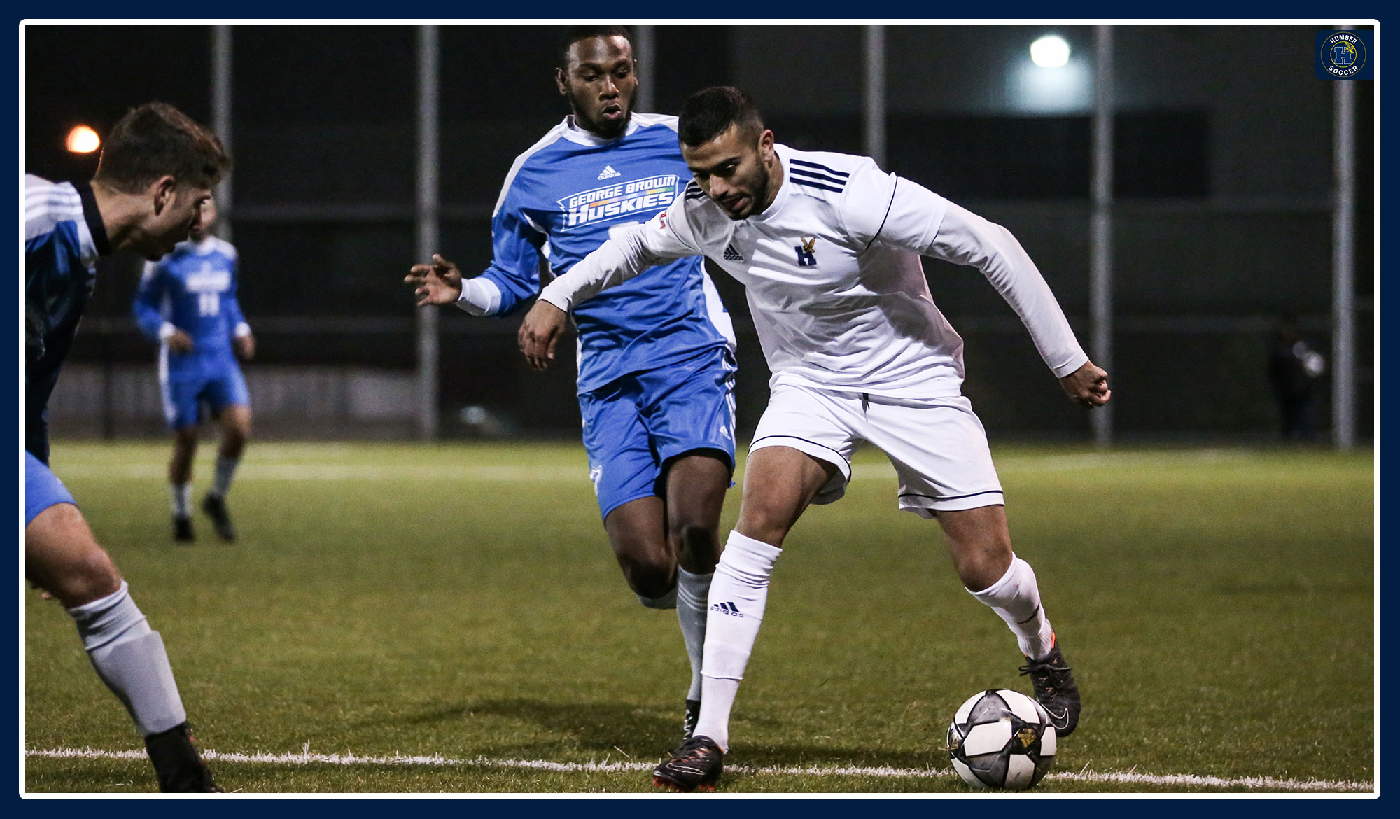 Uday Arora fends off a George Brown defender.