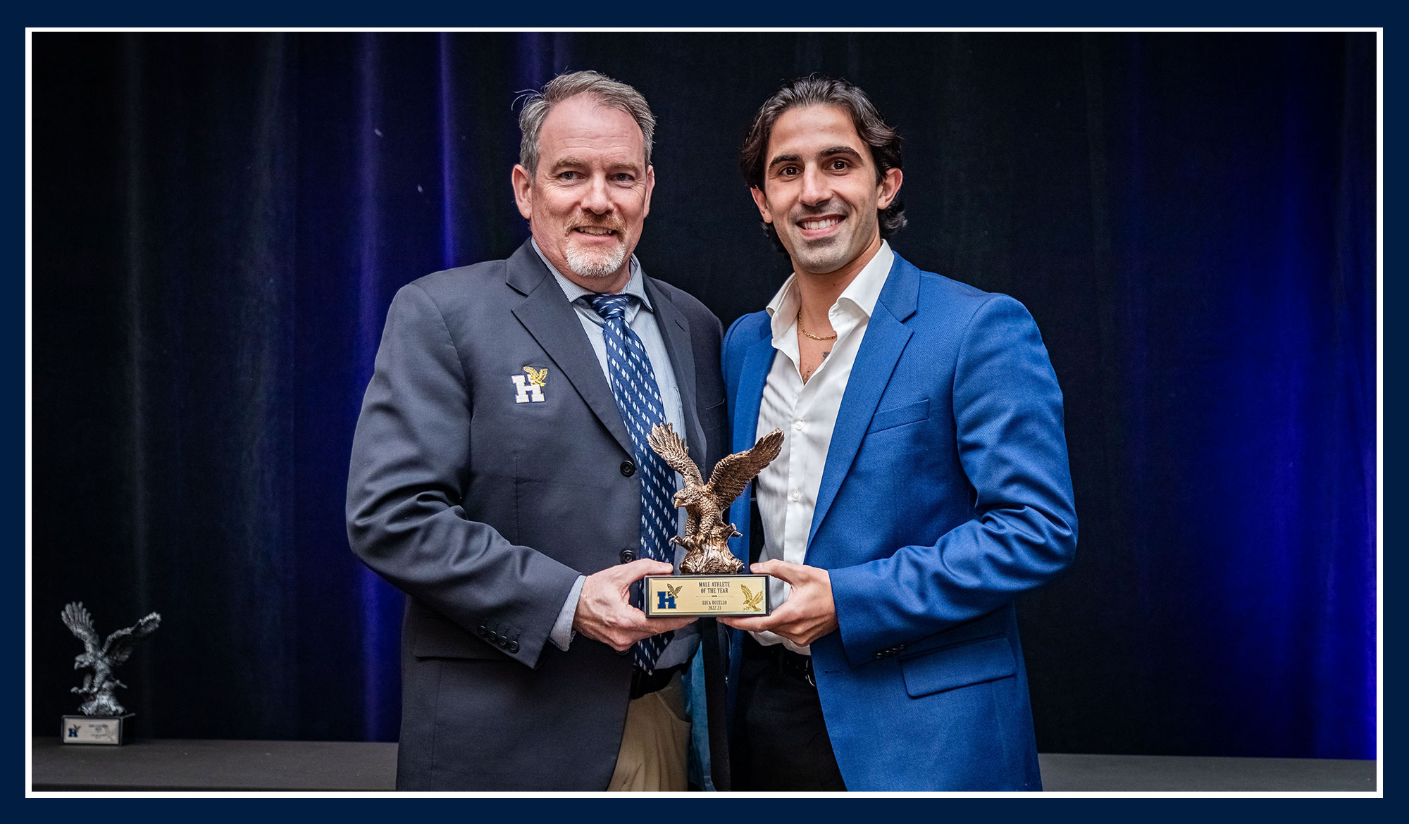 Luca receiving his award from Ray Chateau