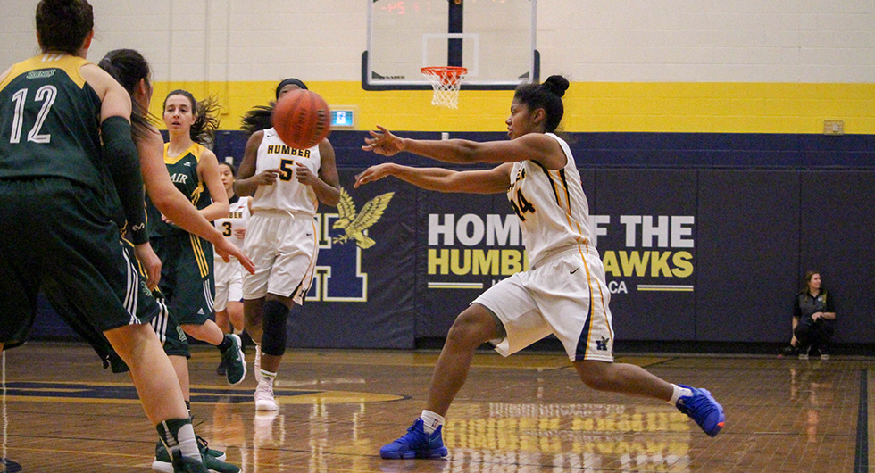 HAWKS DOMINATE SECOND HALF TO ADVANCE TO SEMIS