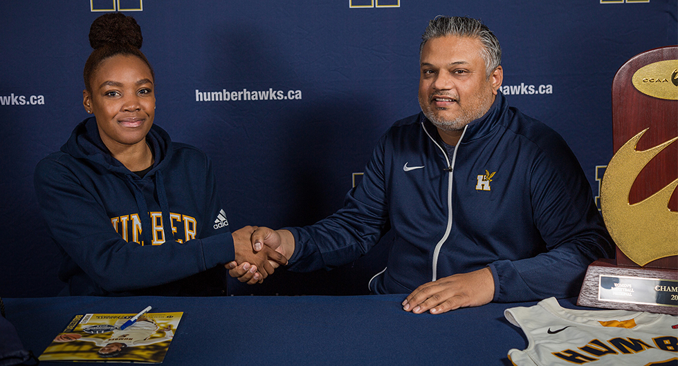 NATIONAL CHAMPIONS SIGN BRITTANIA BROWN