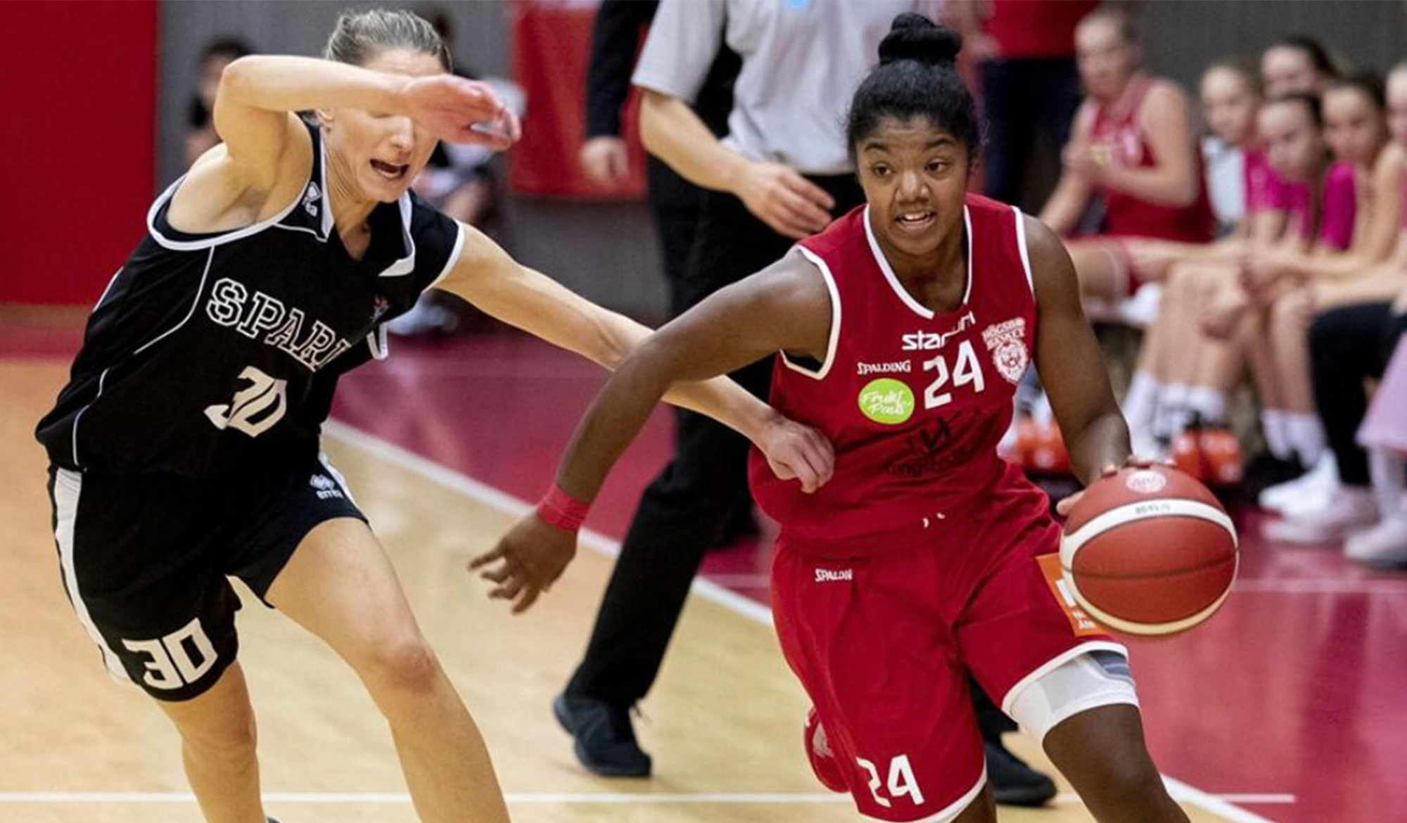 Ceejay Nofuente dribbling by a defender.