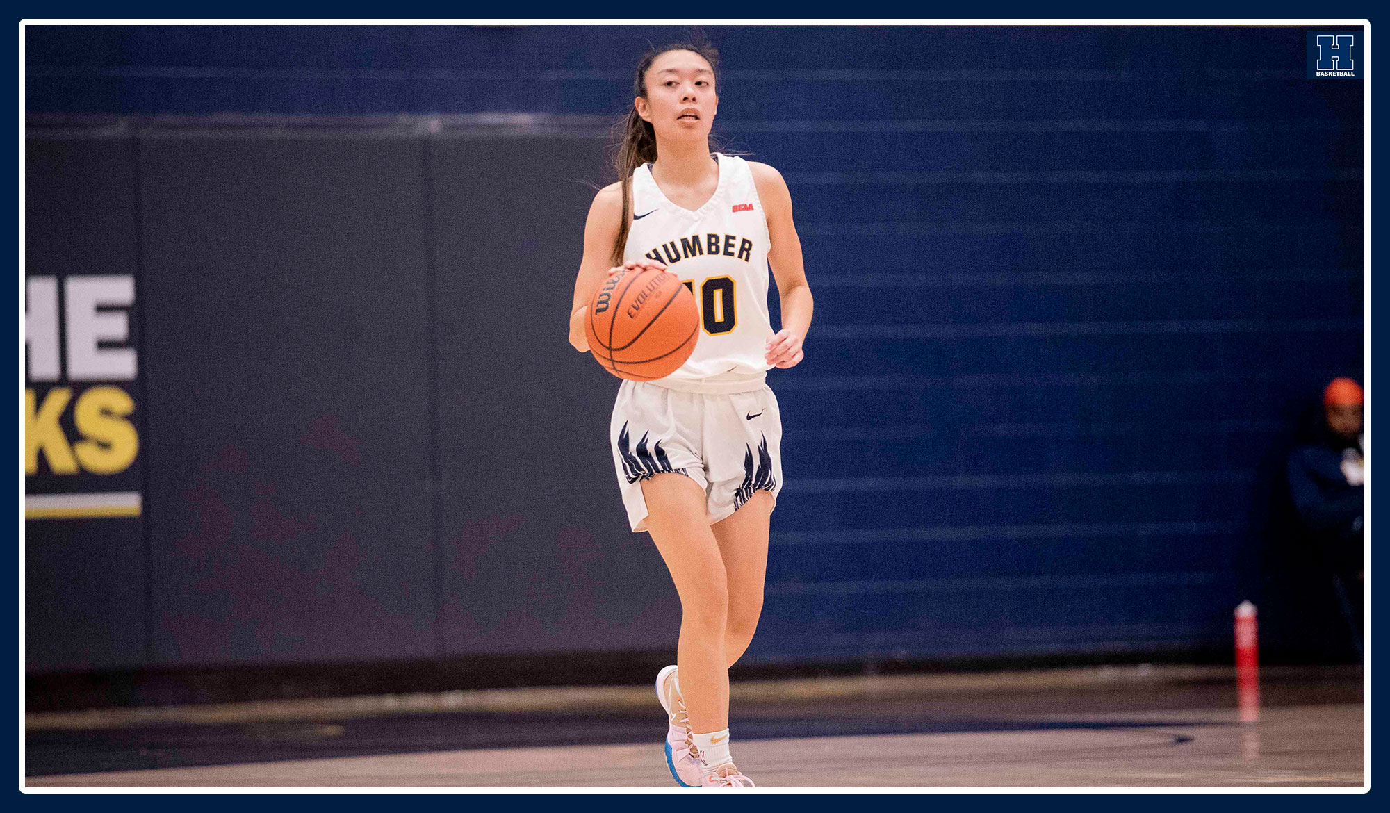 Ylagan brings the ball up the court