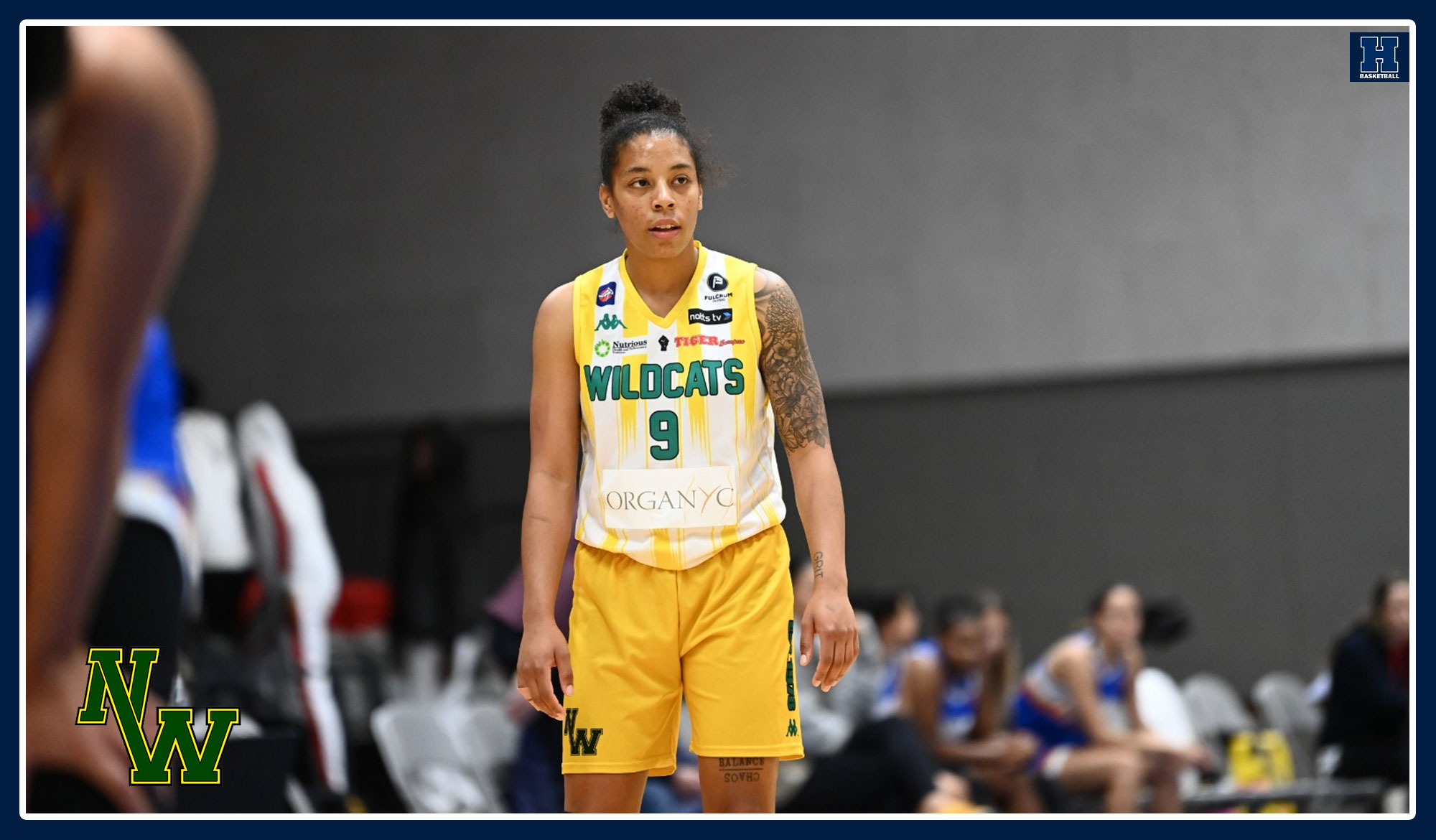 Gyles playing basketball for the Wildcats