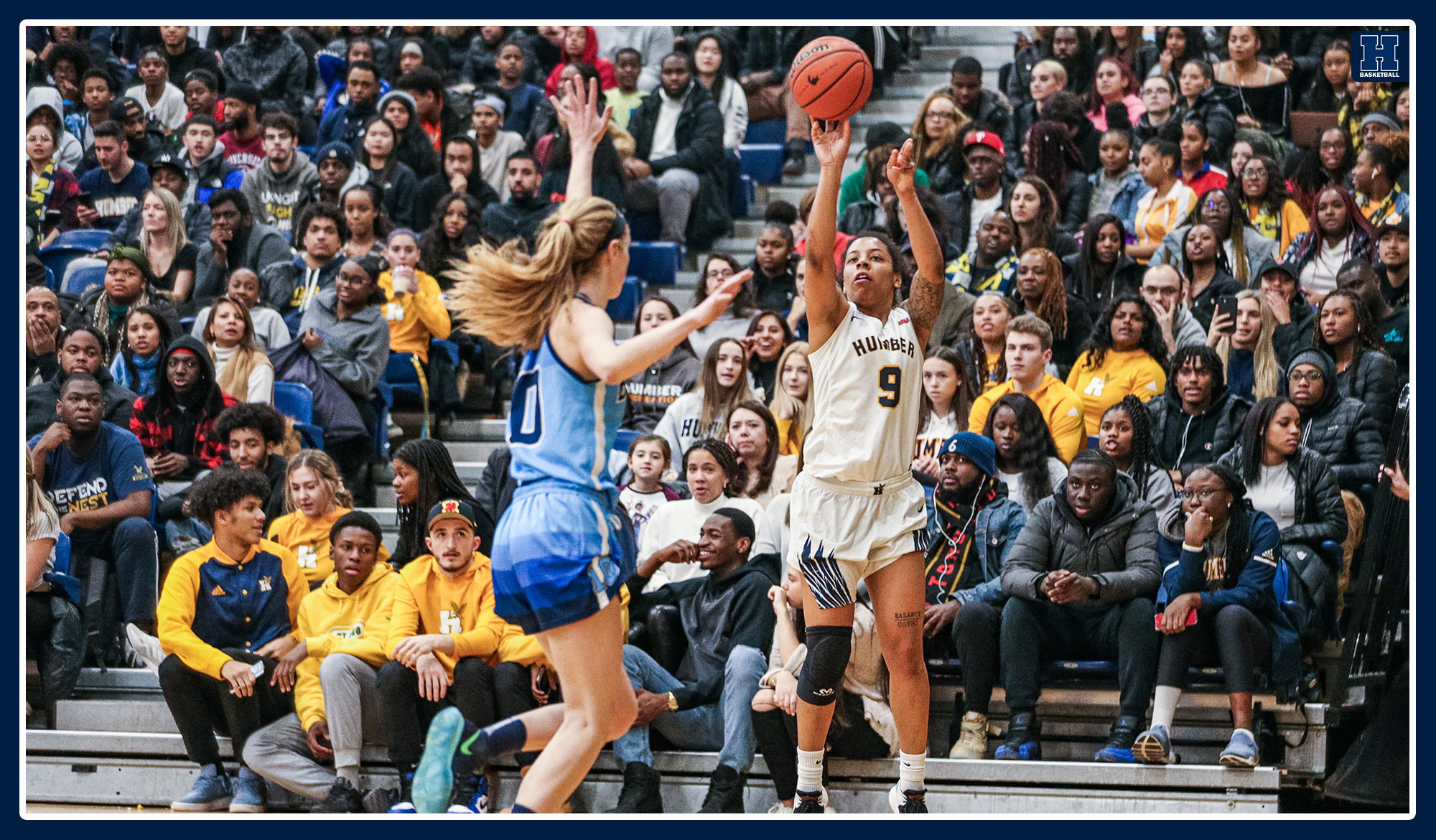 Jahnae Gyles hits a game-tying triple over a Sheridan defender during the 2020 season.