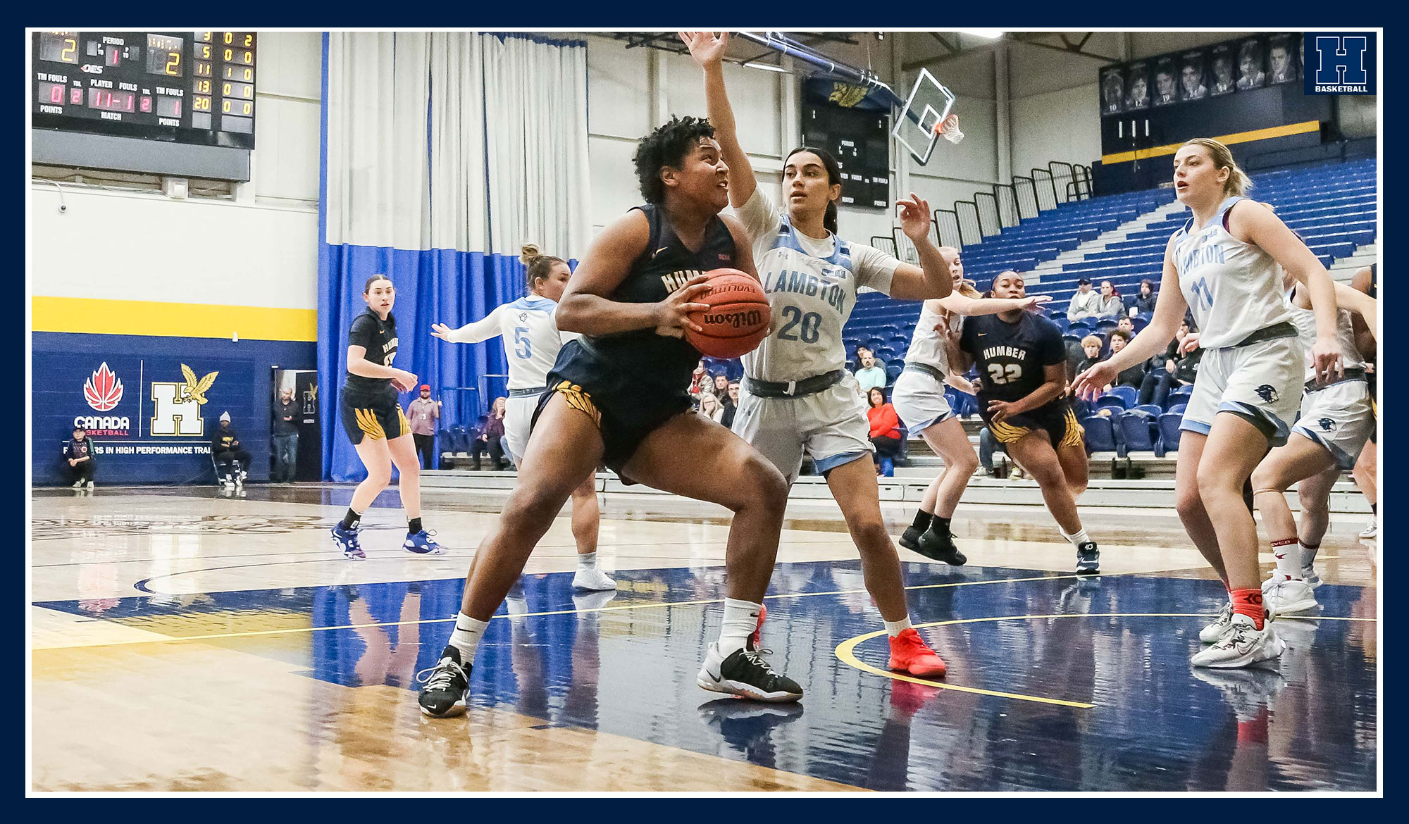 Kayah Clarke with the ball under the basket