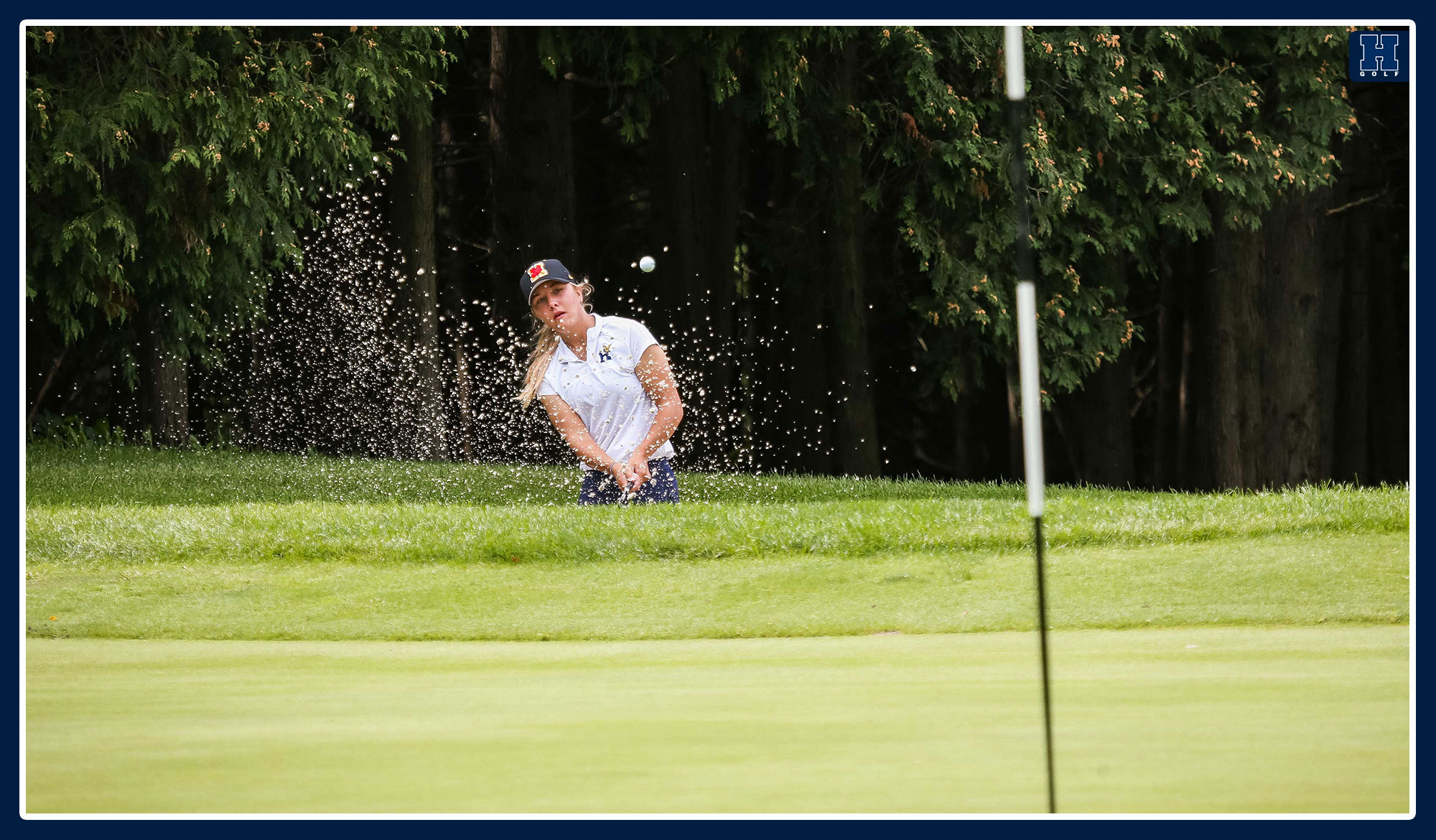 Madison Ouellette shoots out of a greenside bunker
