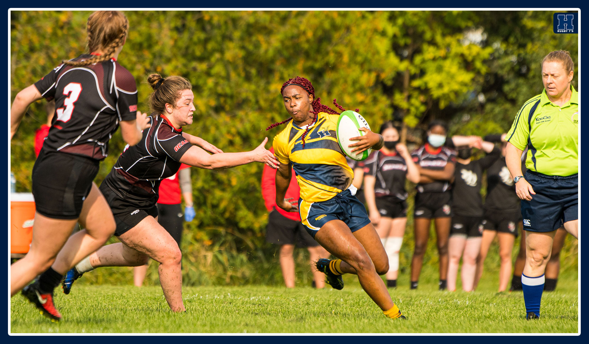 Essence McCarthy-Palmer runs by a Seneca defender