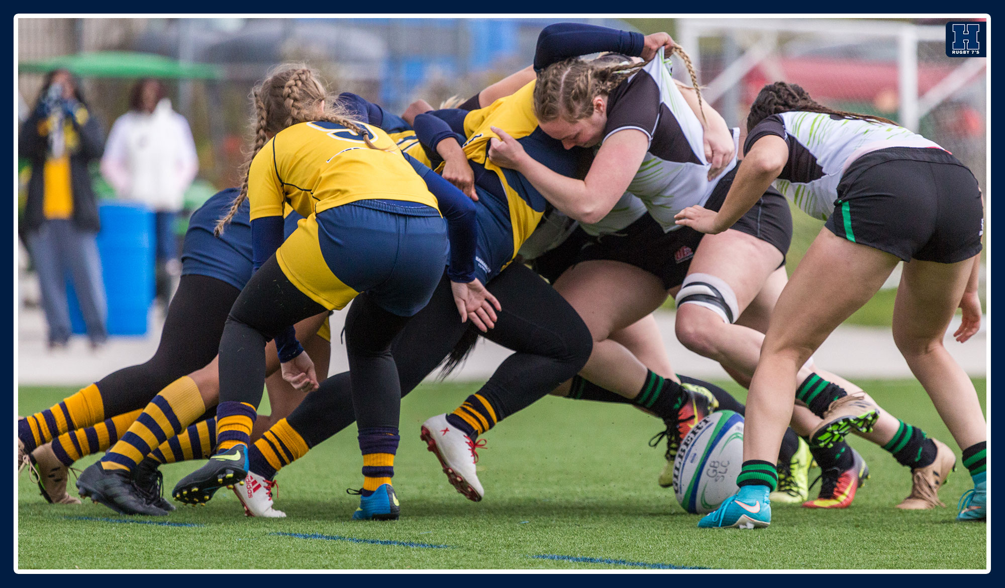 Rugby sevens battle for the ball in a scrum with Algonquin