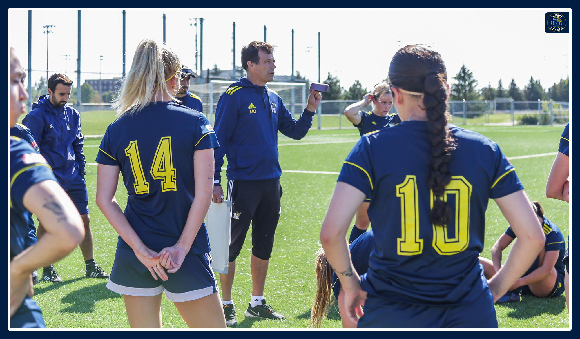 Coach Ongaro speaking to his team pre-game.