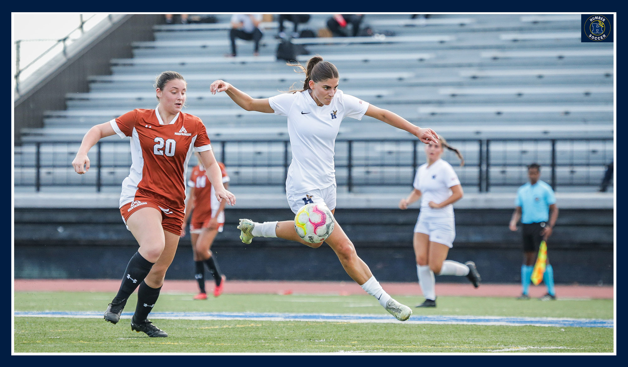 Cassy Ettore fighting off a defender