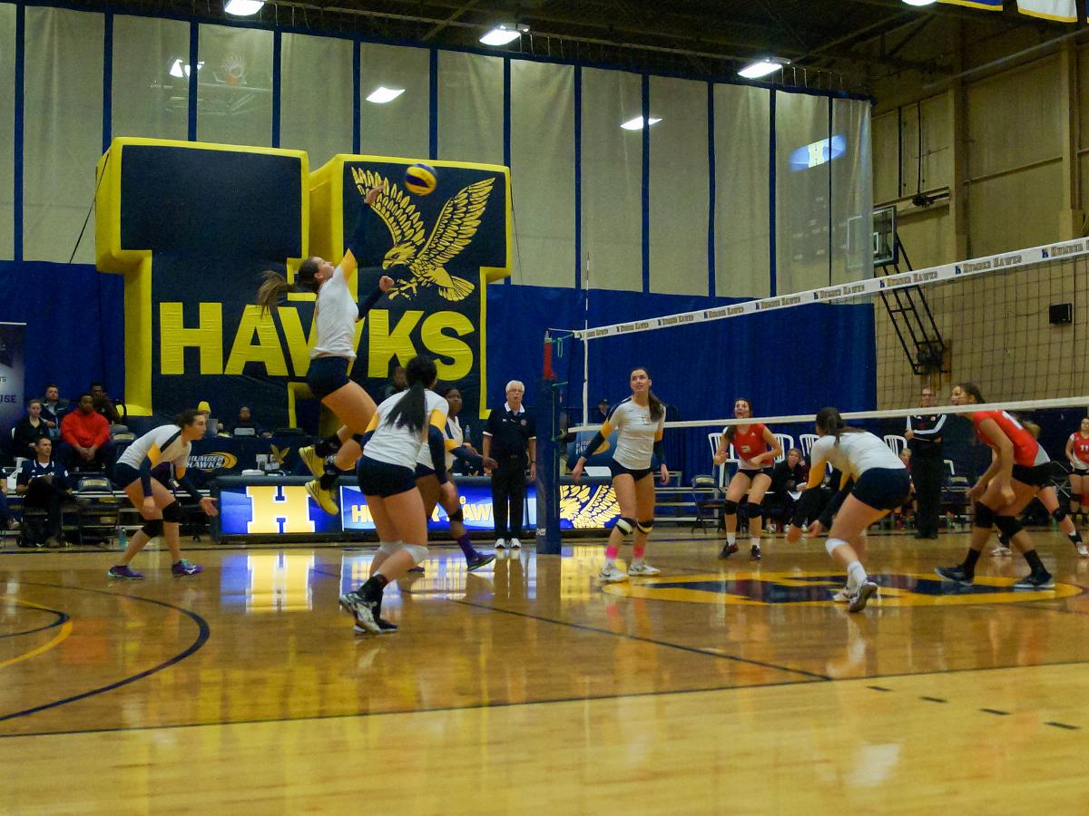 UNDERMANNED HAWKS USE DEPTH TO WIN HOME OPENER