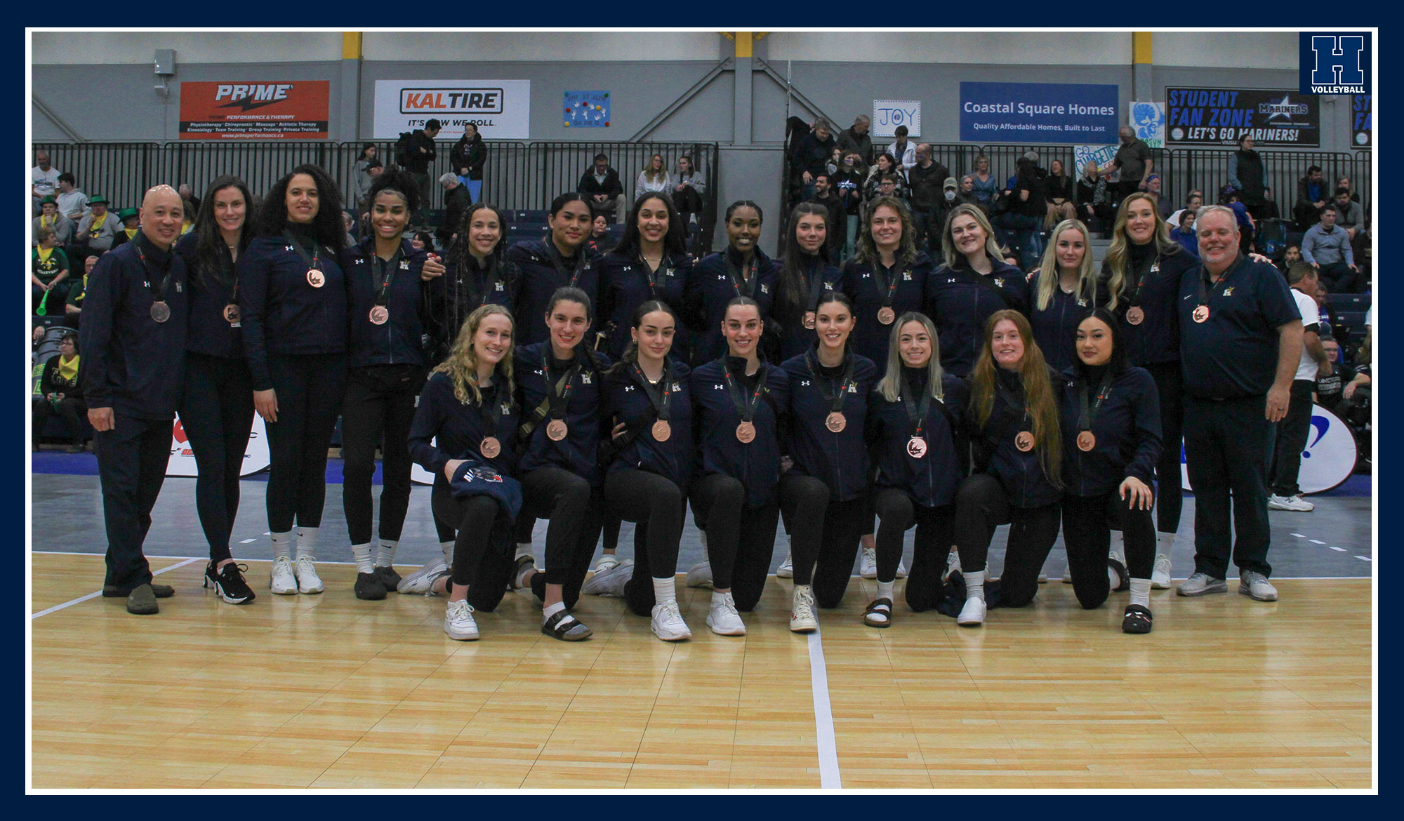 Humber women's volleyball team photo with their bronze medals