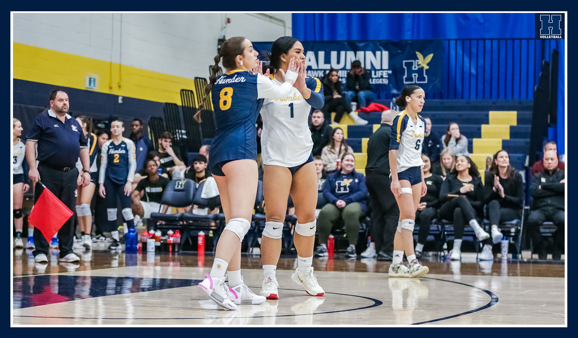 Cholette and Telan celebrating a point